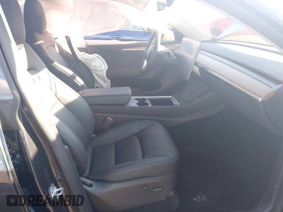 2024 Tesla Model Y Long Range with VIN 7SAYGAEEXRF212415, listed as a IAAI auction lot 41665627 with Not Provided miles and . Bid and sale history available at DreamBid. Image 5.