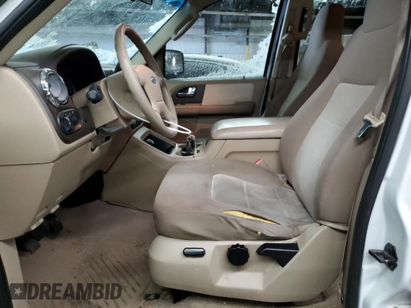2005 Ford Expedition Special Service with VIN 1FMPU16565LA52584, listed as a Copart auction lot 82121934 with 184,558 mi miles and Salvage Title. Bid and sale history available at carsss.com. Image 7.