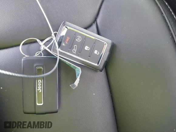 2023 Jeep Grand Cherokee Limited with VIN 1C4RJGBG5PC648630, listed as a IAAI auction lot 42263915 with 24,976 mi miles and . Bid and sale history available at DreamBid. Image 11.