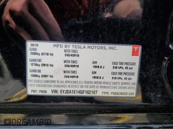 2016 Tesla Model S 70 with VIN 5YJSA1E14GF162187, listed as a Copart auction lot 59308185 with 98,088 mi miles and Salvage title. Bid and sale history available at DreamBid. Image 12.