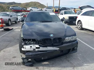 2001 BMW M5 z VIN WBSDE93421BZ99483, wystawiony jako IAAI lot #41892842 z przebiegiem 134 689 mil mil oraz . Historia ofert i sprzedaży dostępna na DreamBid. Obrazek 13.