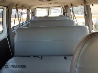 1998 Ford Econoline Wagon XL z VIN 1FBSS31L6WHB61464, wystawiony jako Copart lot #53628534 z przebiegiem 115 866 mil mil oraz Szkoda całkowita • Salvage title. Historia ofert i sprzedaży dostępna na DreamBid. Obrazek 10.