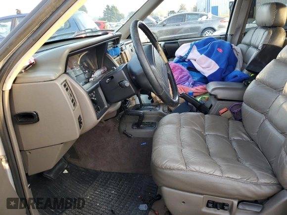 1995 Jeep Grand Cherokee Limited with VIN 1J4GZ78Y2SC603292, listed as a Copart auction lot 84449764 with 153,673 mi miles and Non Repairable. Bid and sale history available at carsss.com. Image 7.