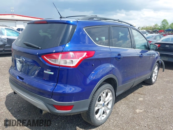 2013 Ford Escape SE with VIN 1FMCU0GXXDUA71589, listed as a IAAI auction lot 42122707 with 144,972 mi miles and . Bid and sale history available at carsss.com. Image 4.