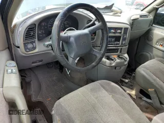 2000 Chevrolet Astro with VIN 1GNDM19W1YB143971, listed as a Copart auction lot 77984874 with 278,301 mi miles and Salvage Title. Bid and sale history available at carsss.com. Image 8.