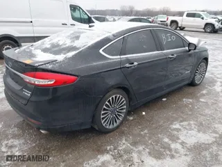 2018 Ford Fusion Hybrid Titanium with VIN 3FA6P0RU3JR241733, listed as a IAAI auction lot 41554479 with 89,756 mi miles. Bid and sale history available at carsss.com. Image 4.