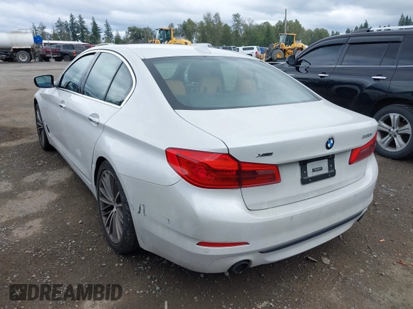 2018 BMW 5 Series 530i xDrive with VIN WBAJA7C5XJWA72470, listed as a IAAI auction lot 42526656 with 66,979 mi miles and . Bid and sale history available at DreamBid. Image 3.