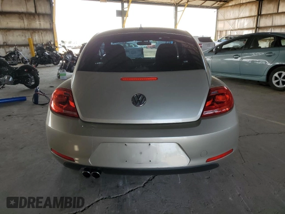 2012 Volkswagen Beetle 2.5L with VIN 3VWHX7AT5CM643314, listed as a Copart auction lot 58843455 with 72,448 mi miles and Salvage title. Bid and sale history available at DreamBid. Image 6.