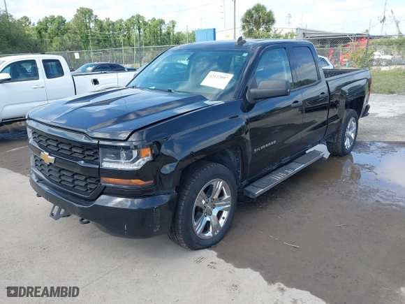 2018 Chevrolet Silverado 1500 Custom with VIN 1GCRCPEC3JZ329430, listed as a IAAI auction lot 42122097 with 199,580 mi miles. Bid and sale history available at carsss.com. Image 2.