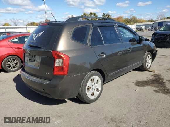 2009 Kia Rondo LX Base with VIN KNAFG528497260778, listed as a Copart auction lot 76497534 with 276,585 mi miles and Salvage Title. Bid and sale history available at carsss.com. Image 3.
