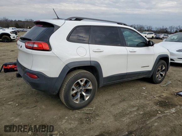 2015 Jeep Cherokee Trailhawk z VIN 1C4PJMBB1FW528766, wystawiony jako Copart lot #46879355 z przebiegiem 248 676 mil mil oraz Szkoda całkowita • Salvage title. Historia ofert i sprzedaży dostępna na DreamBid. Obrazek 3.