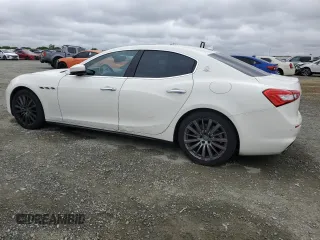 2018 Maserati Ghibli z VIN ZAM57XSA9J1271727, wystawiony jako Copart lot #52155305 z przebiegiem 62 081 mil mil oraz Szkoda całkowita • Salvage title. Historia ofert i sprzedaży dostępna na DreamBid. Obrazek 2.