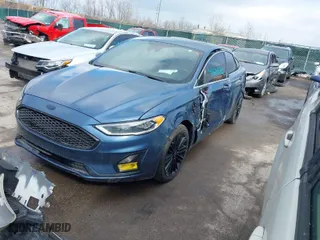 2019 Ford Fusion Energi Titanium with VIN 3FA6P0SU0KR111372, listed as a IAAI auction lot 41685702 with 107,407 mi miles. Bid and sale history available at carsss.com. Image 2.