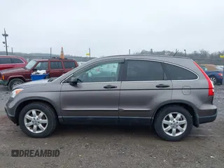 2009 Honda CR-V EX with VIN 5J6RE485X9L036252, listed as a IAAI auction lot 42017954 with 216,225 mi miles. Bid and sale history available at carsss.com. Image 14.