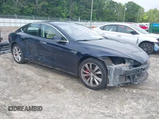2014 Tesla Model S 60 with VIN 5YJSA1H17EFP33860, listed as a IAAI auction lot 42471432 with 142,045 mi miles and . Bid and sale history available at DreamBid. Image 1.
