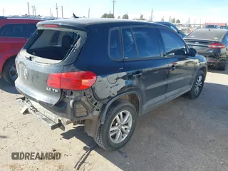 2013 Volkswagen Tiguan S z VIN WVGAV3AXXDW594680, wystawiony jako IAAI lot #41652323 z przebiegiem 136 382 mil mil oraz . Historia ofert i sprzedaży dostępna na DreamBid. Obrazek 4.