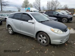 2008 Toyota Matrix STD with VIN 2T1KR32E28C700516, listed as a Copart auction lot 52072585 with 228,761 mi miles and Salvage Title. Bid and sale history available at DreamBid. Image 4.