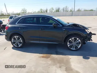 2021 Audi Q3 S line Premium Plus with VIN WA1EECF3XM1133790, listed as a IAAI auction lot 41870016 with 43,794 mi miles and . Bid and sale history available at DreamBid. Image 13.