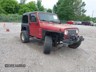 1999 Jeep Wrangler Sport z VIN 1J4FY19SXXP493453, wystawiony jako IAAI lot #42199045 z przebiegiem 198 557 mil mil oraz . Historia ofert i sprzedaży dostępna na DreamBid. Obrazek 1.
