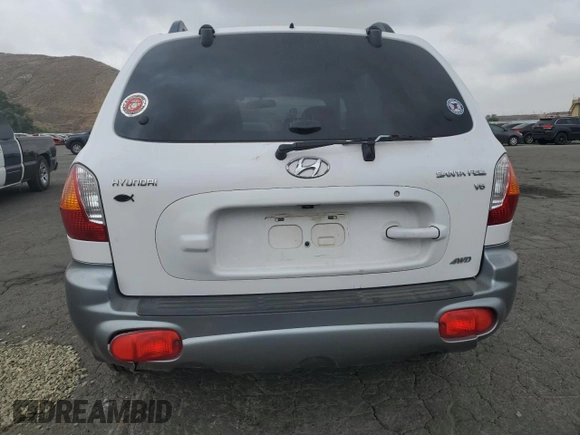 2002 Hyundai Santa Fe GLS with VIN KM8SC73D02U311622, listed as a Copart auction lot 71742874 with 99,807 mi miles and Salvage Title. Bid and sale history available at carsss.com. Image 6.