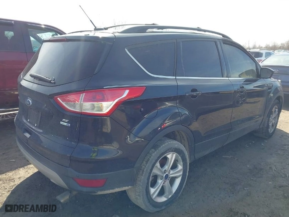 2014 Ford Escape SE with VIN 1FMCU9GX2EUE19004, listed as a IAAI auction lot 41737486 with 1 mi miles. Bid and sale history available at carsss.com. Image 4.
