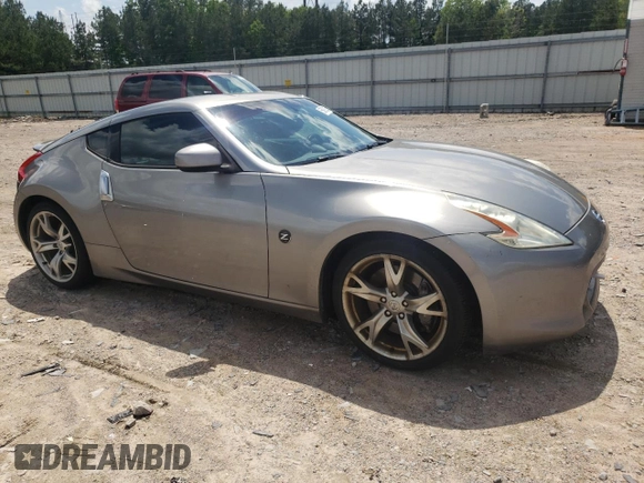 2009 Nissan 370Z Touring with VIN JN1AZ44E49M402605, listed as a Copart auction lot 55972355 with 157,066 mi miles and Clean Title. Bid and sale history available at DreamBid. Image 4.