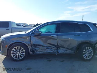 2020 Cadillac XT6 FWD Premium Luxury with VIN 1GYKPCRS8LZ129799, listed as a IAAI auction lot 41602536 with 96,865 mi miles. Bid and sale history available at carsss.com. Image 14.