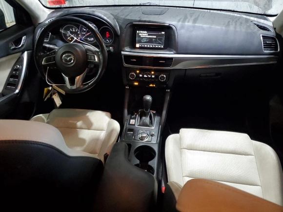 2016 Mazda CX-5 Grand Touring with VIN JM3KE4DY0G0765406, listed as a Copart auction lot 46499385 with 116,155 mi miles and Salvage Title. Bid and sale history available at carsss.com. Image 8.