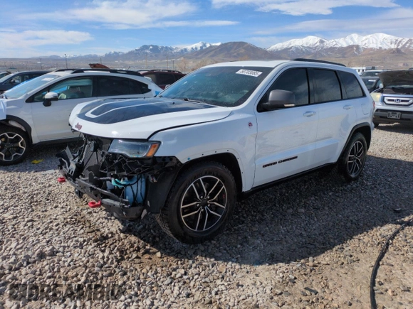 2021 Jeep Grand Cherokee Trailhawk with VIN 1C4RJFLG4MC703945, listed as a Copart auction lot 50703085 with 57,109 mi miles and Salvage Title. Bid and sale history available at carsss.com. Image 1.