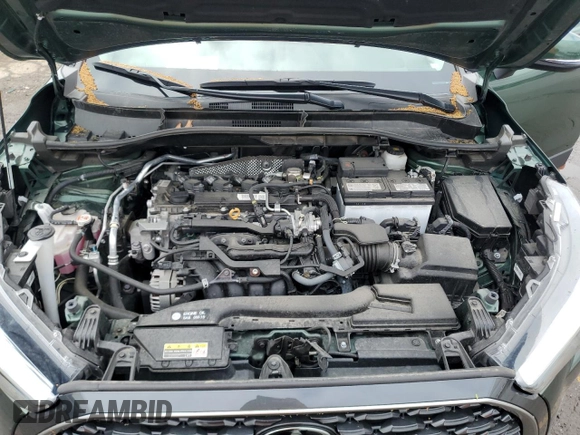 2022 Toyota Corolla Cross XLE with VIN 7MUDAABG6NV006829, listed as a Copart auction lot 55626965 with 23,187 mi miles and Salvage title. Bid and sale history available at DreamBid. Image 12.