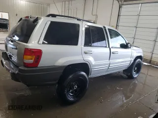 2002 Jeep Grand Cherokee Limited z VIN 1J8GW58S02C279251, wystawiony jako Copart lot #61563465 z przebiegiem 182 244 mil mil oraz Szkoda całkowita • Salvage title. Historia ofert i sprzedaży dostępna na DreamBid. Obrazek 3.