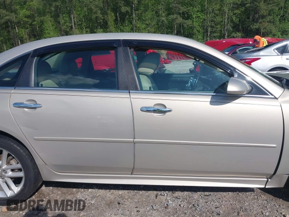 2012 Chevrolet Impala LTZ with VIN 2G1WC5E37C1180838, listed as a IAAI auction lot 41976474 with 107,397 mi miles and . Bid and sale history available at DreamBid. Image 13.