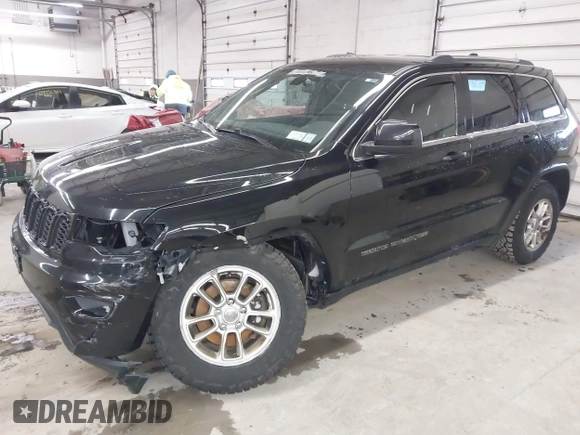2018 Jeep Grand Cherokee Laredo E with VIN 1C4RJFAG0JC154937, listed as a IAAI auction lot 41966764 with 85,415 mi miles and . Bid and sale history available at DreamBid. Image 2.