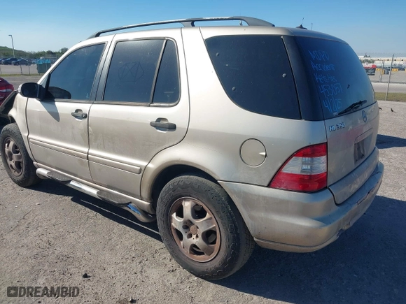 2003 Mercedes-Benz M-Class 3.7L with VIN 4JGAB57E23A453057, listed as a IAAI auction lot 41704721 with 190,649 mi miles. Bid and sale history available at carsss.com. Image 3.