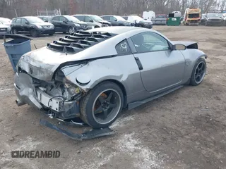 2003 Nissan 350Z Touring z VIN JN1AZ34E33T003711, wystawiony jako IAAI lot #41351191 z przebiegiem 167 503 mil mil oraz . Historia ofert i sprzedaży dostępna na DreamBid. Obrazek 4.