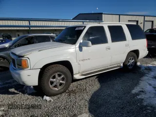 1999 Cadillac Escalade z VIN 1GYEK13R3XR406970, wystawiony jako Copart lot #87623365 z przebiegiem 189 339 mil mil oraz Szkoda całkowita • Salvage title. Historia ofert i sprzedaży dostępna na DreamBid. Obrazek 1.