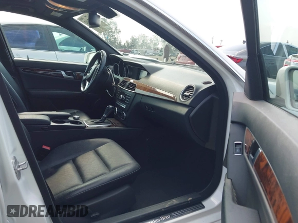 2014 Mercedes-Benz C 250 Sport with VIN WDDGF4HB5EG245388, listed as a IAAI auction lot 42407602 with 96,415 mi miles and . Bid and sale history available at DreamBid. Image 5.