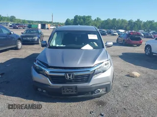2017 Honda Ridgeline RTL-T z VIN 5FPYK3F64HB022095, wystawiony jako IAAI lot #42219954 z przebiegiem 85 876 mil mil oraz . Historia ofert i sprzedaży dostępna na DreamBid. Obrazek 11.