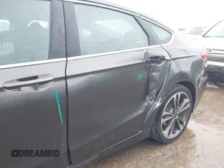 2020 Ford Fusion Titanium with VIN 3FA6P0K97LR192657, listed as a IAAI auction lot 42170258 with 87,696 mi miles and . Bid and sale history available at DreamBid. Image 18.