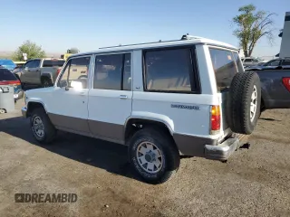1990 Isuzu Trooper с VIN JACCH58R2L8912963, выставлен на аукционе Copart как лот 53236865 с пробегом 206 634 миль миль и Чистый • Clean title. История ставок и продаж доступна на DreamBid. Изображение 2.