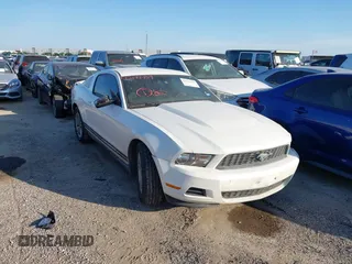2012 Ford Mustang Premium with VIN 1ZVBP8AM7C5267791, listed as a IAAI auction lot 42191459 with 149,403 mi miles and . Bid and sale history available at DreamBid. Image 1.
