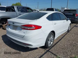 2017 Ford Fusion SE z VIN 3FA6P0H7XHR144020, wystawiony jako IAAI lot #41984688 z przebiegiem 189 326 mil mil oraz . Historia ofert i sprzedaży dostępna na DreamBid. Obrazek 4.