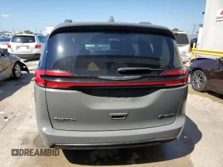 2021 Chrysler Pacifica Hybrid Touring L with VIN 2C4RC1L72MR599413, listed as a Copart auction lot 56419875 with 108,986 mi miles and Salvage title. Bid and sale history available at DreamBid. Image 6.