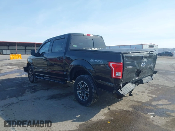 2015 Ford F-150 XLT with VIN 1FTEW1EG8FFB31487, listed as a IAAI auction lot 41609774 with 175,030 mi miles. Bid and sale history available at carsss.com. Image 3.
