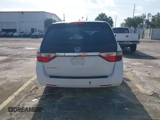 2012 Honda Odyssey EX-L z VIN 5FNRL5H61CB032353, wystawiony jako IAAI lot #42471691 z przebiegiem 186 257 mil mil oraz . Historia ofert i sprzedaży dostępna na DreamBid. Obrazek 16.