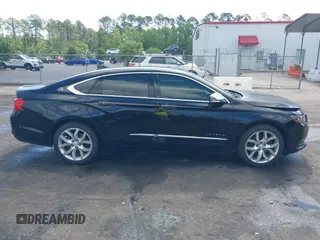 2017 Chevrolet Impala Premier with VIN 1G1145S33HU116013, listed as a IAAI auction lot 42157738 with 153,198 mi miles and . Bid and sale history available at DreamBid. Image 13.