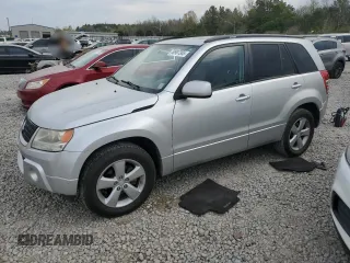 2010 Suzuki Grand Vitara Limited z VIN JS3TE0D73A4100112, wystawiony jako Copart lot #50907365 z przebiegiem 146 484 mil mil oraz Szkoda całkowita • Salvage title. Historia ofert i sprzedaży dostępna na DreamBid. Obrazek 1.