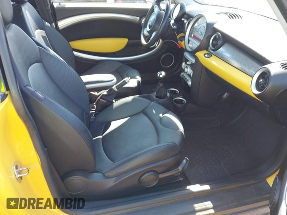 2008 MINI Hardtop S with VIN WMWMF73568TT91873, listed as a IAAI auction lot 42716448 with 77,617 mi miles and . Bid and sale history available at DreamBid. Image 5.