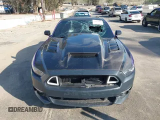 2015 Ford Mustang EcoBoost with VIN 1FA6P8TH5F5358816, listed as a IAAI auction lot 41573005 with 57,975 mi miles and . Bid and sale history available at carsss.com. Image 12.