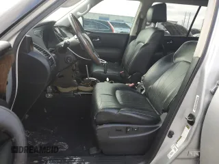 2014 Infiniti QX80 with VIN JN8AZ2NF8E9555594, listed as a Copart auction lot 40000354 with 140,479 mi miles and Salvage title. Bid and sale history available at DreamBid. Image 7.